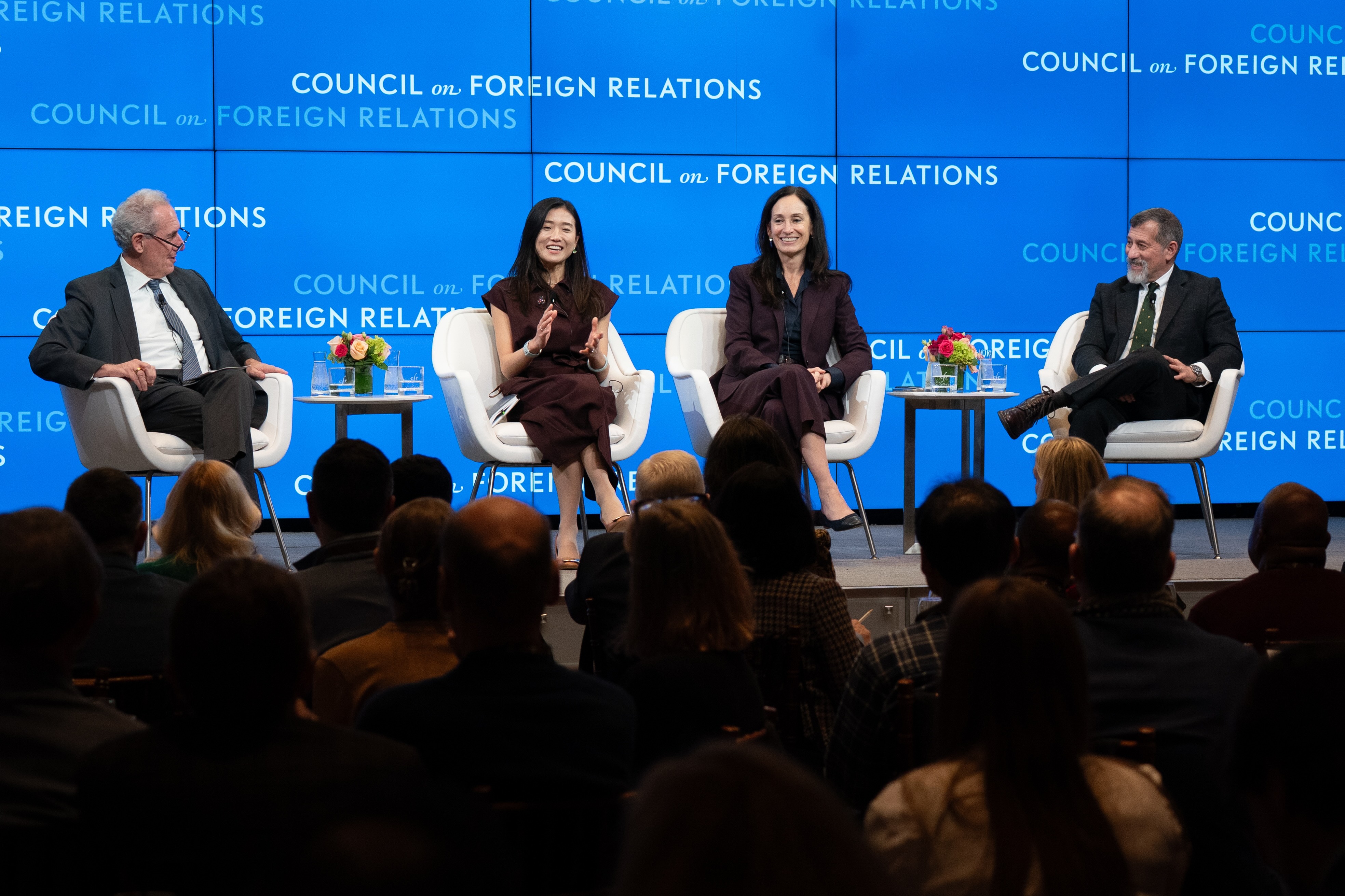 Speakers on stage for discussion