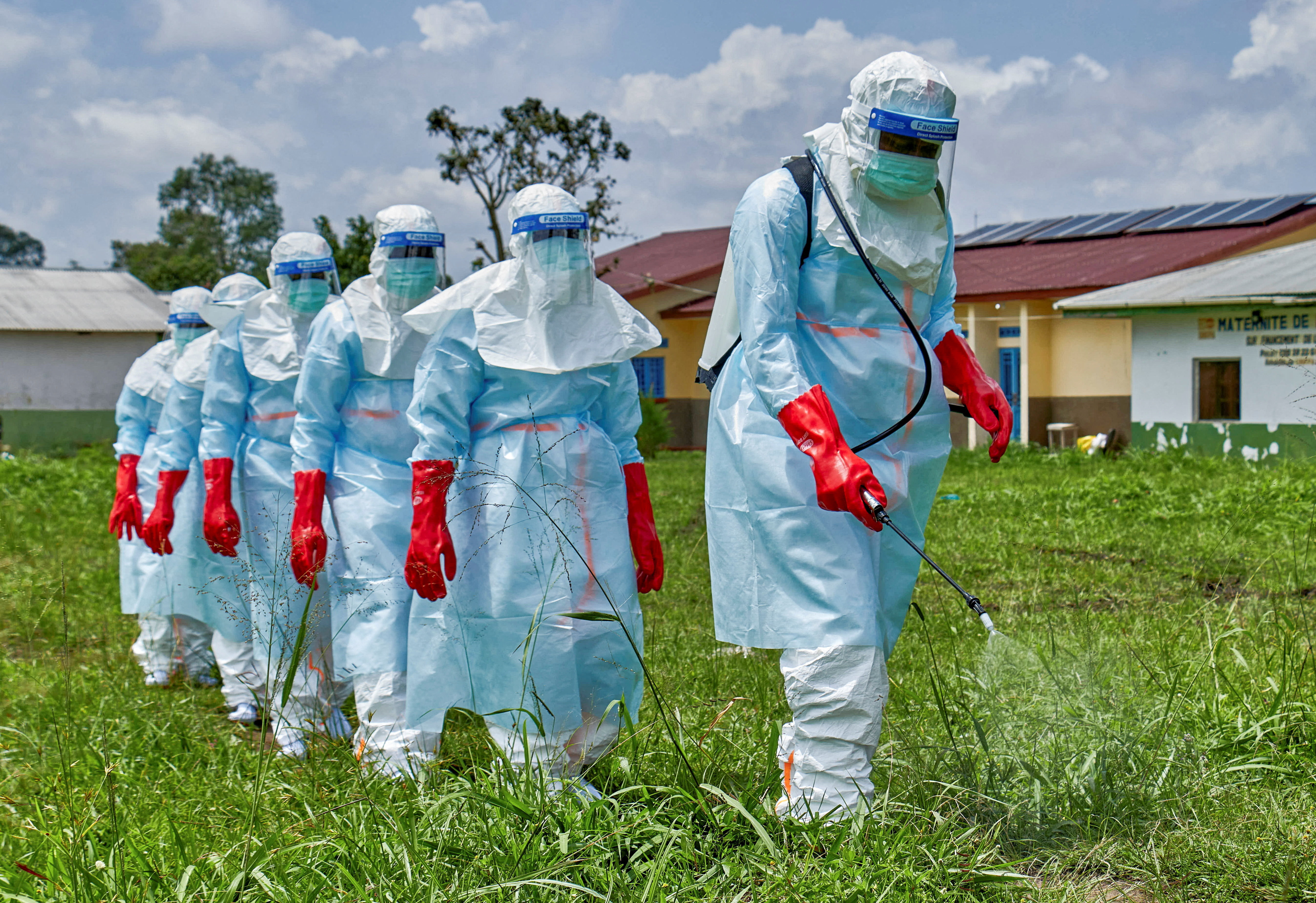 <p>Red Cross workers disinfect Rwampara General Hospital before handling the body of a person who died of Ebola, in Ituri province, Democratic Republic of Congo, on May 21, 2026.</p>
