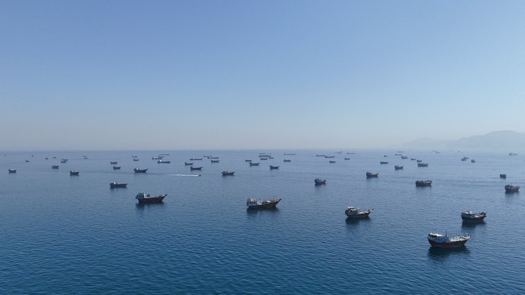 A drone view of vessels anchored in the Strait of Hormuz as seen from Musandam, Oman, June 8, 2026.