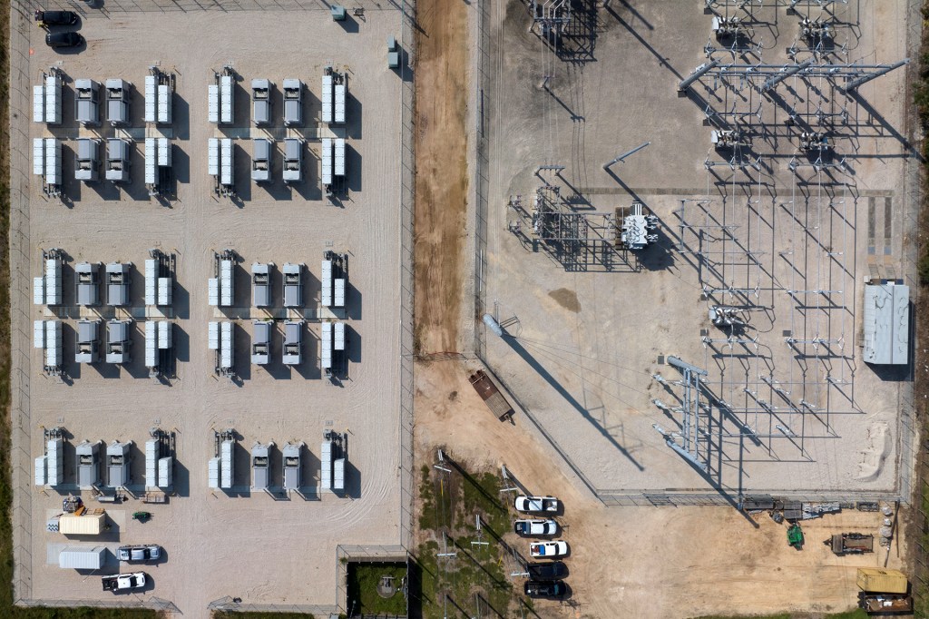 GlidePath's Byrd Ranch energy storage facility is seen next to an electrical power grid in Sweeny, Texas, on May 23, 2023.