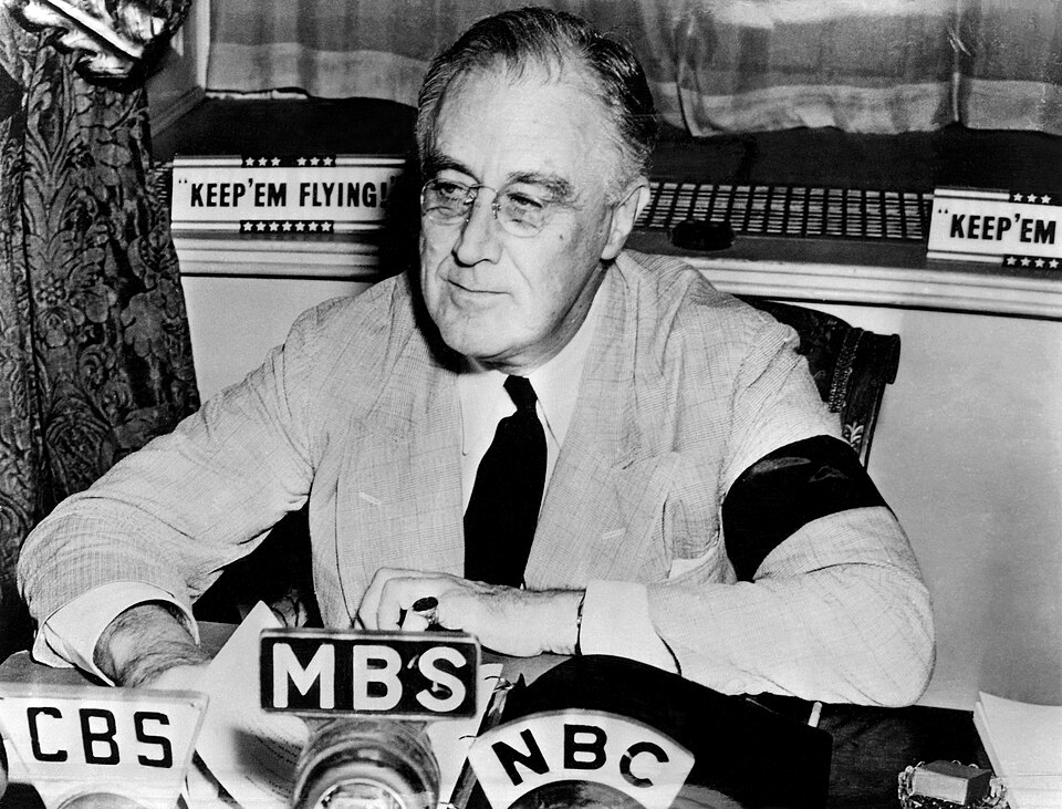 <p>President Franklin D. Roosevelt delivers a national radio address at the White House, September 11, 1941, while wearing a black arm band to mourn the death of his mother four days earlier.</p>
